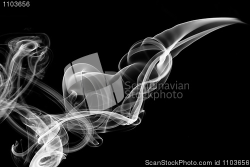 Image of White smoke abstract shape over black