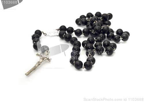 Image of Black beads over white