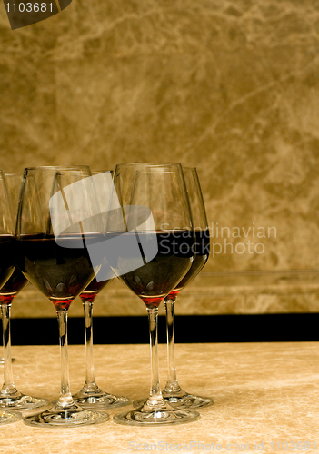 Image of Glasses with red wine on marble
