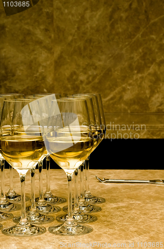 Image of Glasses with white wine on marble