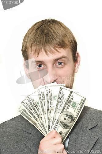 Image of Smiling Businessman with hundreds of dollars