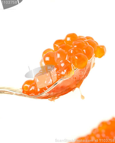 Image of Wealth. Silver spoon with Red caviar