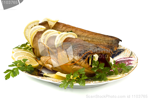 Image of Tasty bloated sheatfish with lemon and parsley