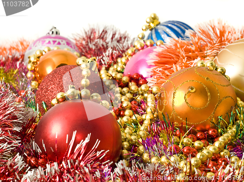Image of Christmas colorful decoration - baubles, tinsel and beads
