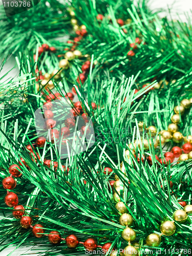 Image of Christmas comes - green tinsel and beads