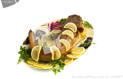 Image of Food - bloated fresh-water catfish (sheatfish) with lemon