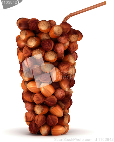 Image of Glass shape made of huzel nuts with straw