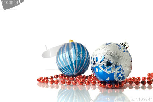 Image of Christmas decoration -  two blue balls and red beads