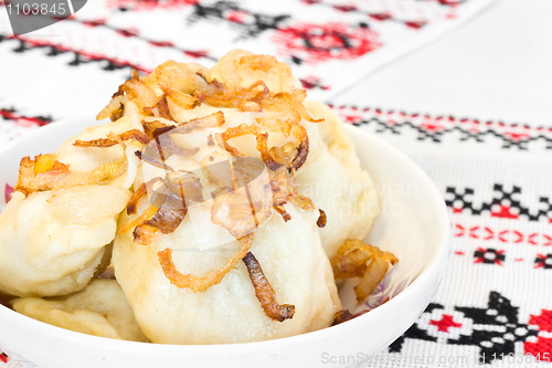 Image of Close-up of Ukrainian dumplings with onion