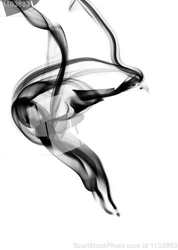 Image of Black magic smoke shapes over white 