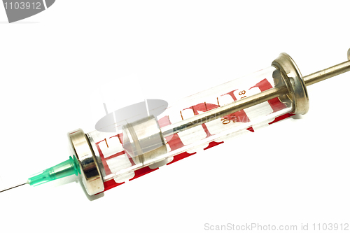 Image of Disease alert - old-fashioned syringe over white