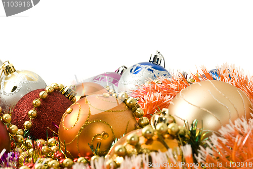 Image of Colorful Christmas decoration balls and bright tinsel 