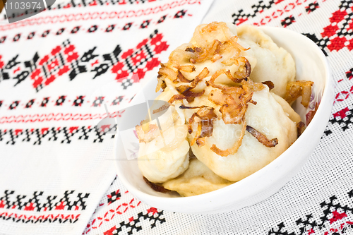 Image of Ukrainian dishes - dumplings with fried onion