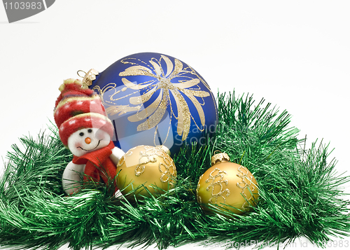 Image of Plush Christmas toy with three colorful New Year decoration Ball