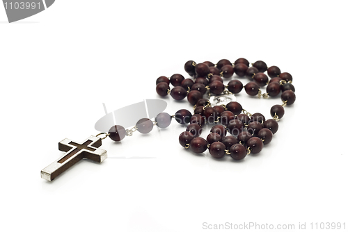 Image of Closeup of Wooden beads over white 