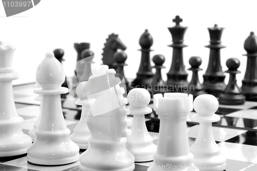 Image of Chess on board over white