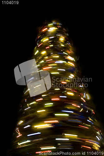 Image of Blurred rotating New Year tree