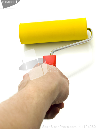 Image of Yellow Roller for renovation in hand