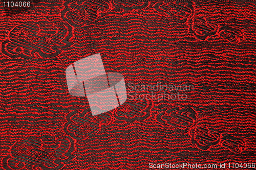 Image of Beautiful fabric with red and black pattern