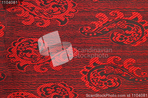 Image of Beautiful fabric with red and black pattern