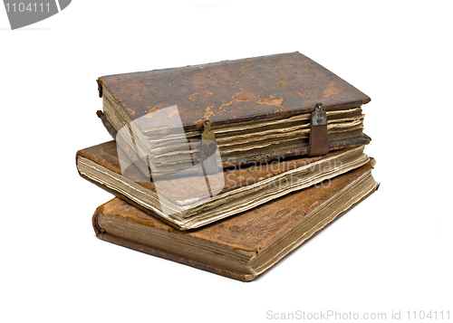 Image of Three Old frayed books isolated over white