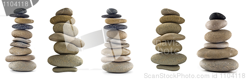 Image of Collection of Balanced stone stacks or towers