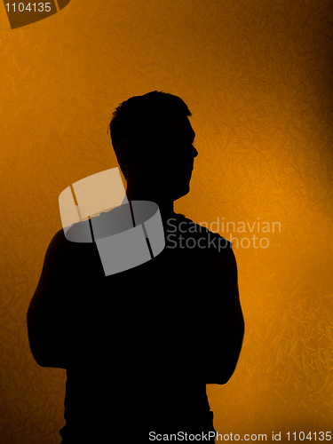 Image of Confidence. Back lit silhouette of man 