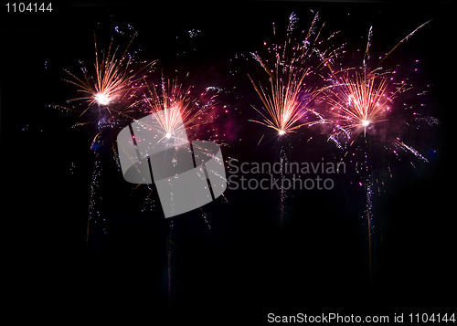 Image of Fireworks in the dark at night 