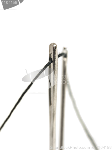 Image of Needles with black thread