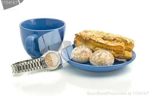 Image of Lunch time - Watch, blue cup, pastry