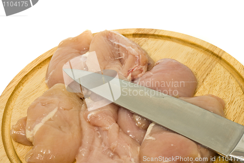 Image of Close-up of Chicken fillet and knife