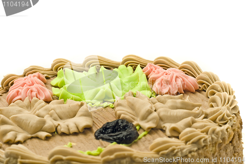 Image of Closeup of Birthday chocolate cake with creamy leaves