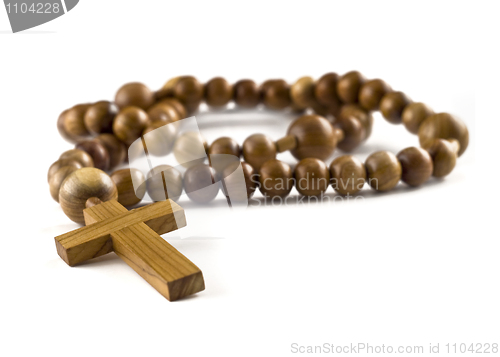 Image of Closeup of Wooden beads isolated over white 