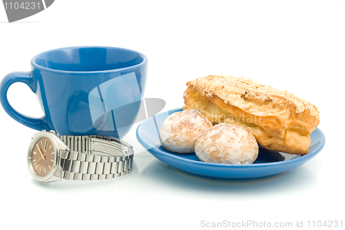 Image of Lunch  - Watch, cup and pastry