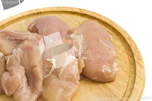 Image of Close-up of Chicken fillet and on hardboard