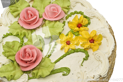 Image of Close-up of tasty cake with cream, pink roses