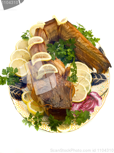 Image of Bloated fresh-water catfish with lemon and parsley