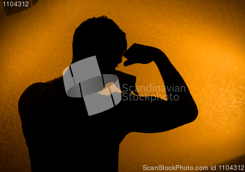 Image of Strength and health. Silhouette of man