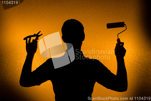 Image of Time for repair and Renovation. Silhouette of man