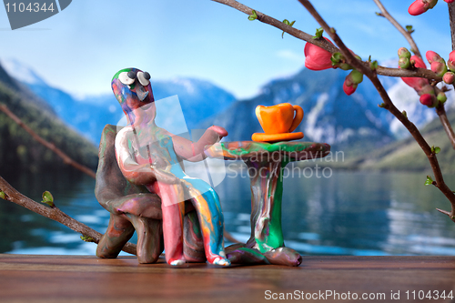 Image of Clay man in Cafe