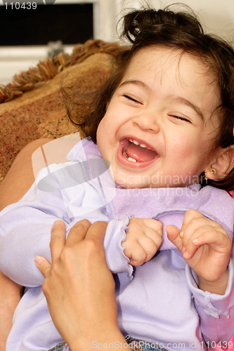 Image of Giggling baby girl