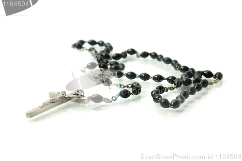 Image of Black rosary isolated over white