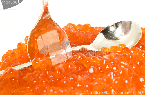 Image of Close-up of Red caviar and silver spoons