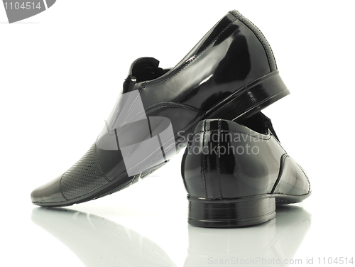 Image of Side and back view of patent-leather shoes 