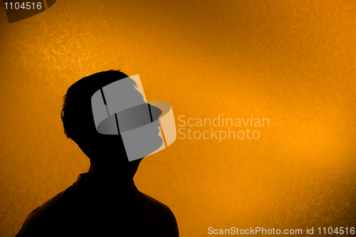 Image of Look ahead - Back lit silhouette of man