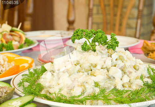 Image of Tasty Russian salad. Banquet in the restaurant