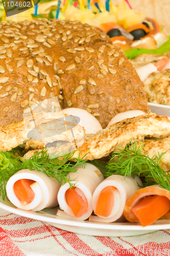 Image of Banquet in the restaurant. Balyk, chops and bread