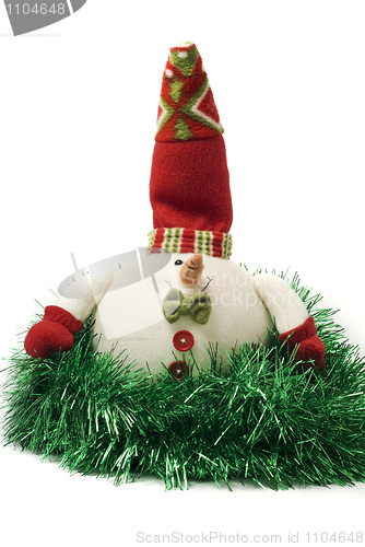 Image of Plush Christmas snowman toy in green tinsel