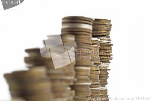 Image of Towers assembled of money. Recession or growth