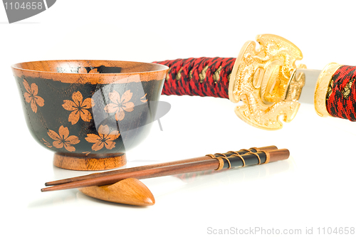 Image of Japanese culture. Katana, Chopsticks and bowl